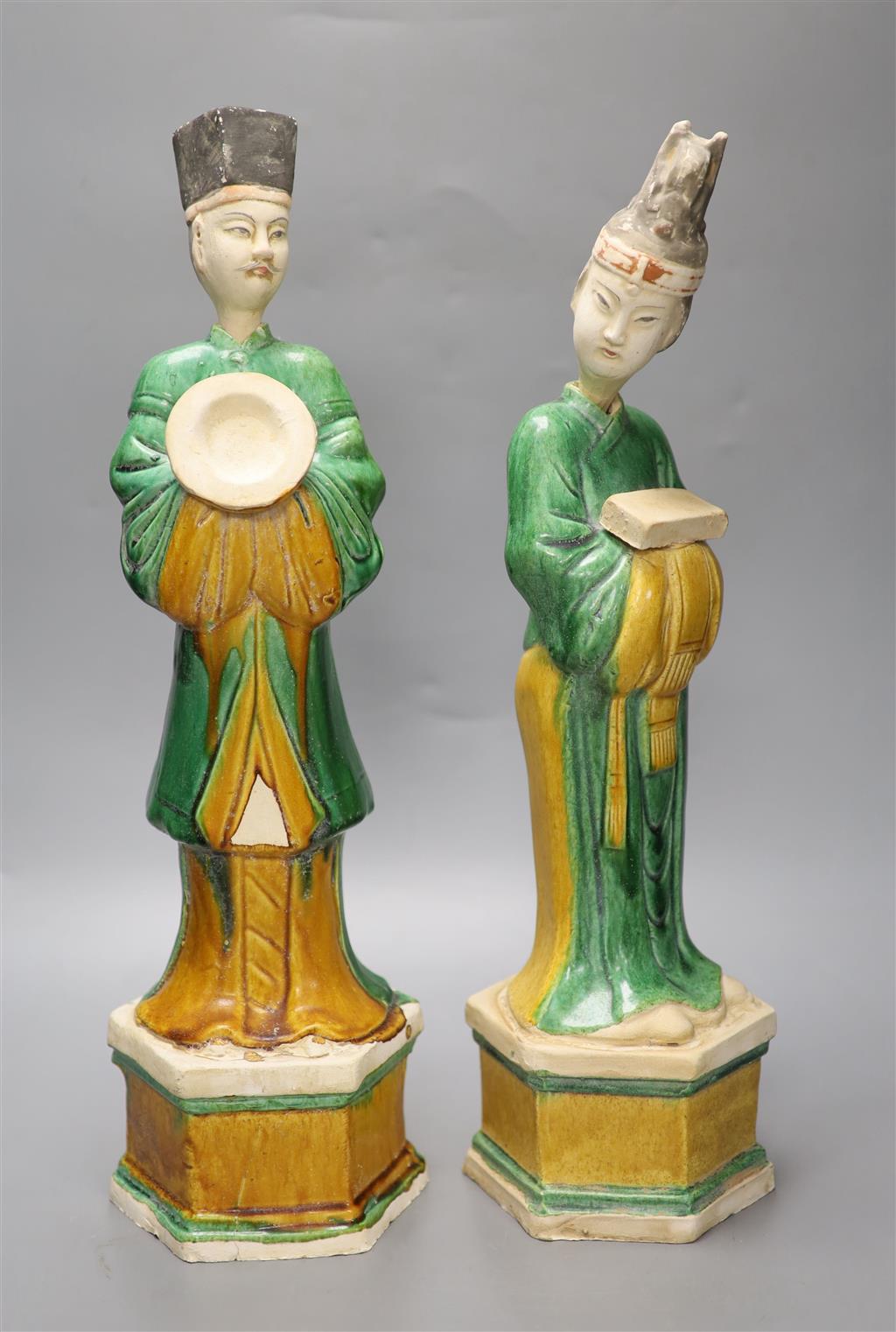 Two Chinese terracotta sancai-glazed male and female tomb figures, each with detachable head, tallest 47cm